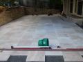 Dudley Outdoor Room With Sandstone Walls, Travertine Paving And Steps