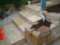 Dudley Outdoor Room With Sandstone Walls, Travertine Paving And Steps