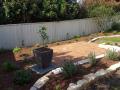 Janet St. Merewether. A Garden Patio. Excavations / Sandstone Walls & Sandstone Garden Edges / Brick Paving / Garden Soils / A Selection Of Shrubs & Pots / Mulch