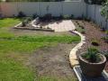 Janet St. Merewether. A Garden Patio. Excavations / Sandstone Walls & Sandstone Garden Edges / Brick Paving / Garden Soils / A Selection Of Shrubs & Pots / Mulch