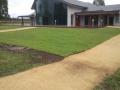 Pokolbin Wine Tasting Pavillion / Brick Garden Walls Capped With Charcoal Pavers / Sloping Sir Walter Lawns / Crushed Granite Pathways Including Crushed Granite Disabled Access Ramp